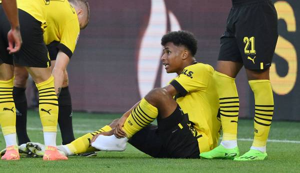 Karim Adeyemi was injured during the first half of Borussia Dortmund's Bundesliga opener against Bayer Leverkusen.